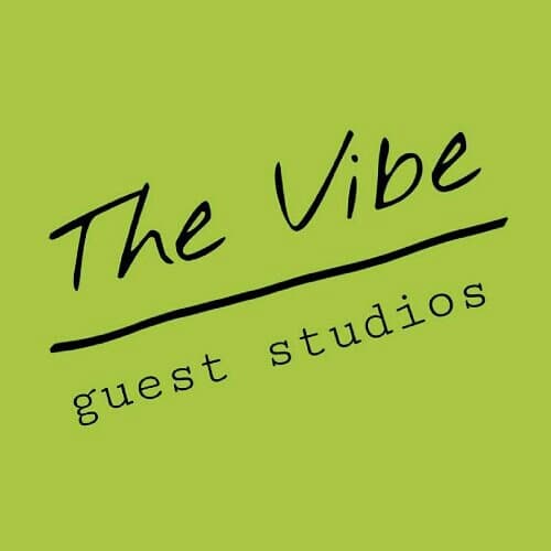 The Vibe Guest Studios logo