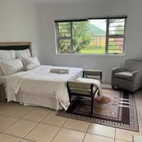 Miche’s Guest House logo